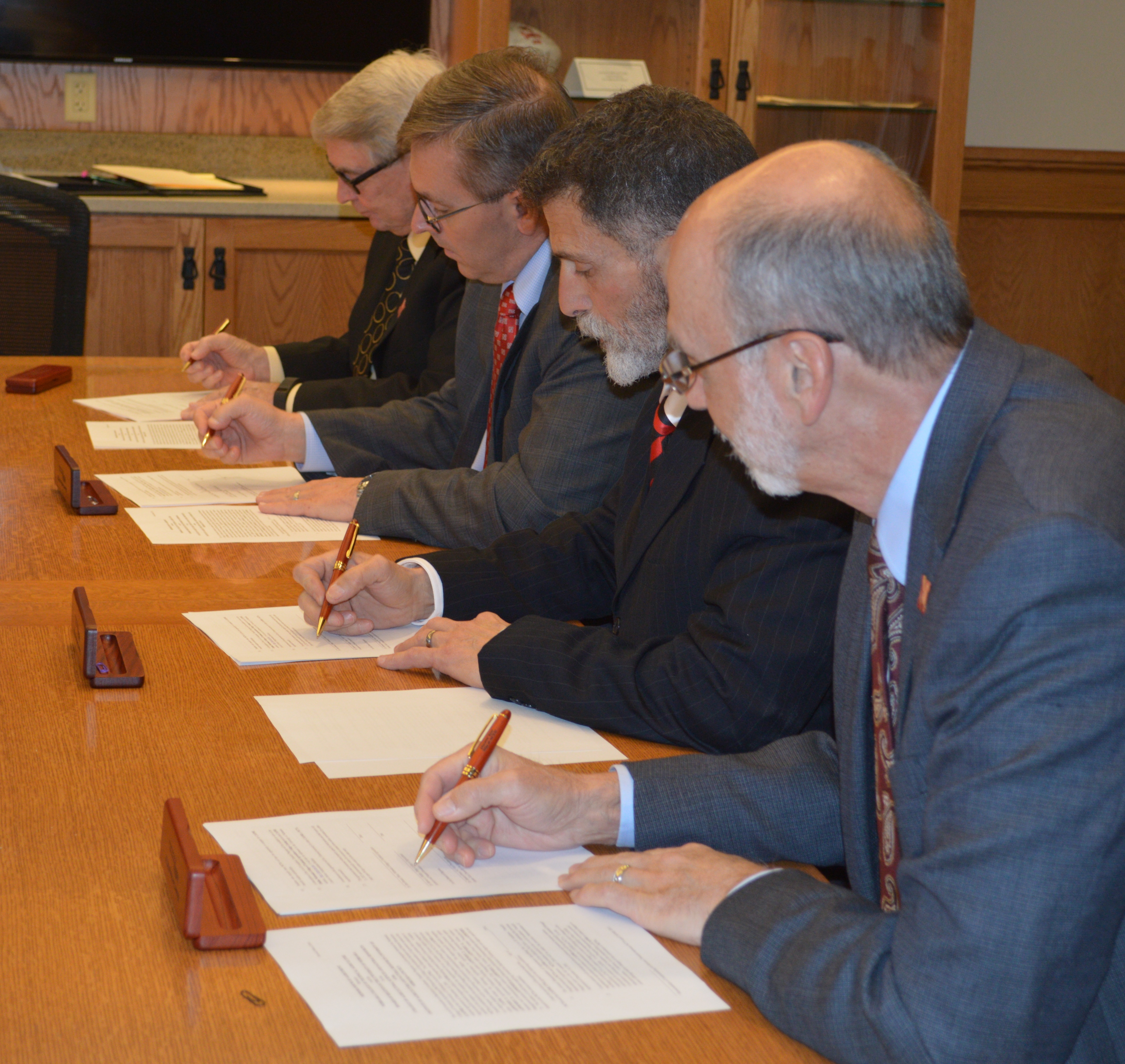NCTA, CASNR and IANR administrators sign the A to B Transfer Agreement