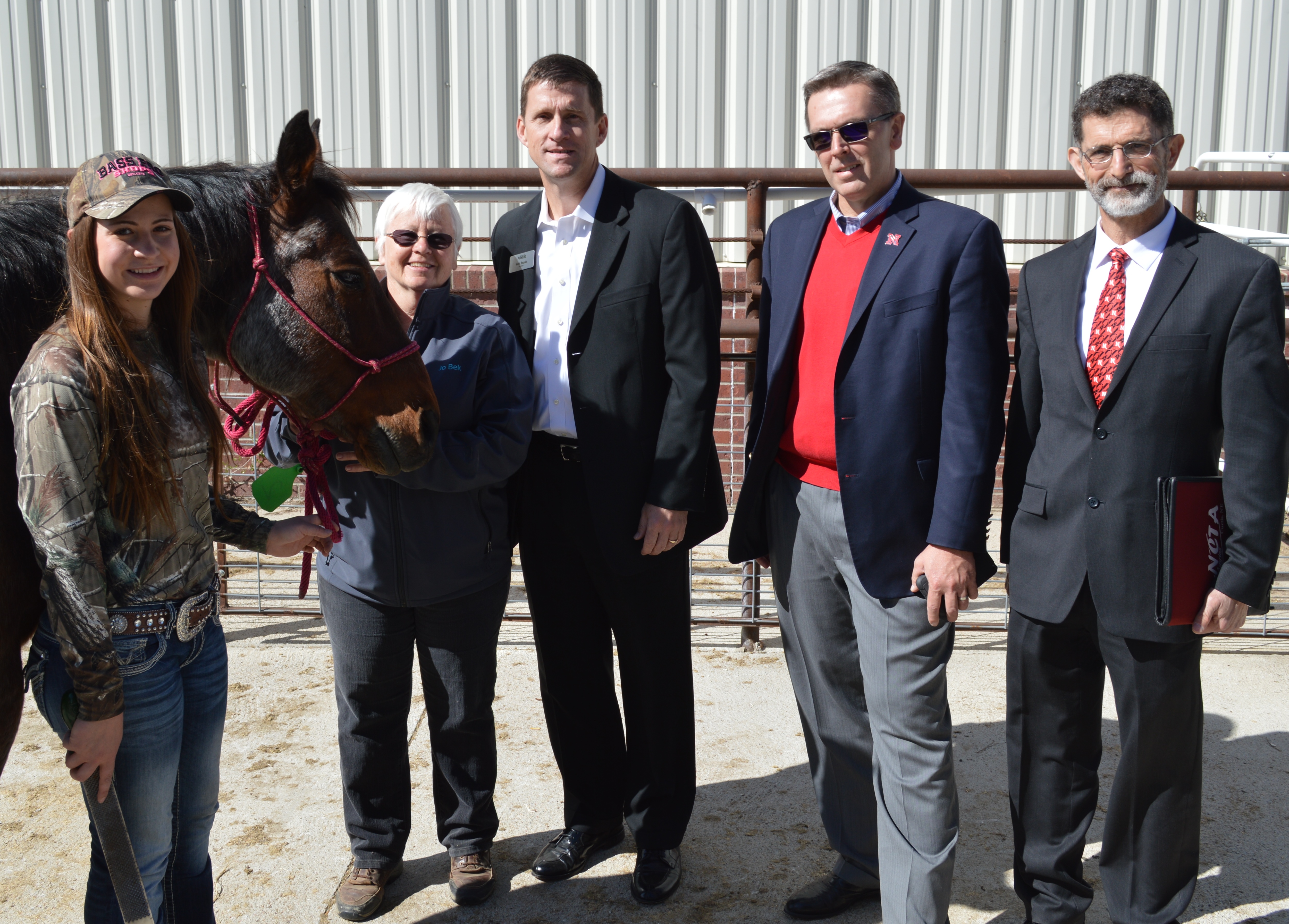 University of Nebraska President Hank Bounds (center) and UNL Chancellor-elect Ronnie Green (second to right) learn about NCTA equine programs, April, 2015.