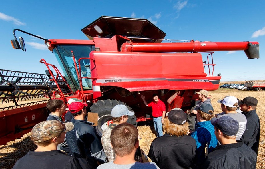 Brad Ramsdale, agronomy professor, discusses harvest operations with an agronomy class at the NCTA farm laboratory. Students can now earn an NCTA Agriculture Certificate with online courses. (Craig Chandler / NCTA News Photo) 