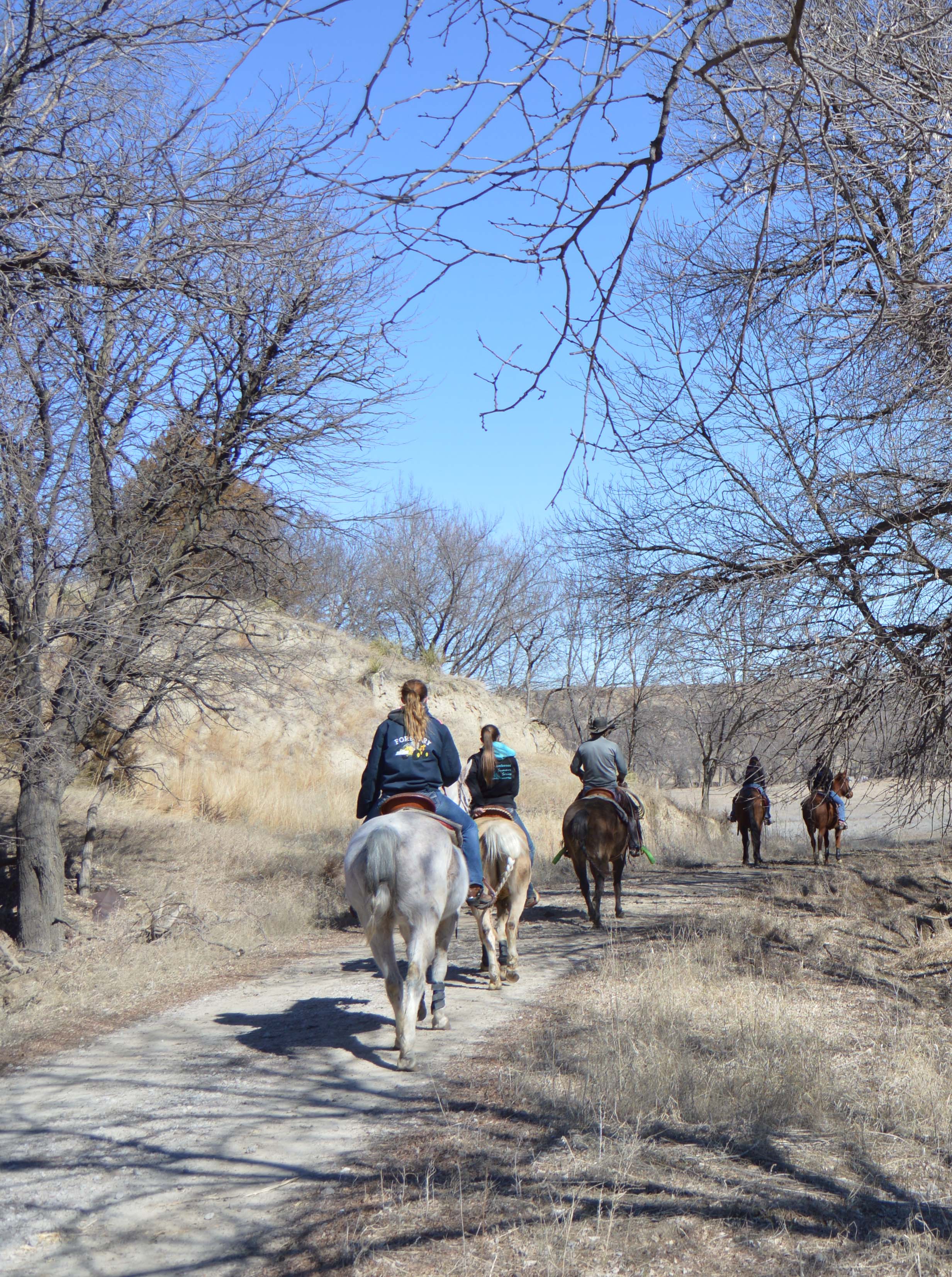 Equine students ride a trail down to Aggieland north of the NCTA campus. (Crawford/NCTA News photo)