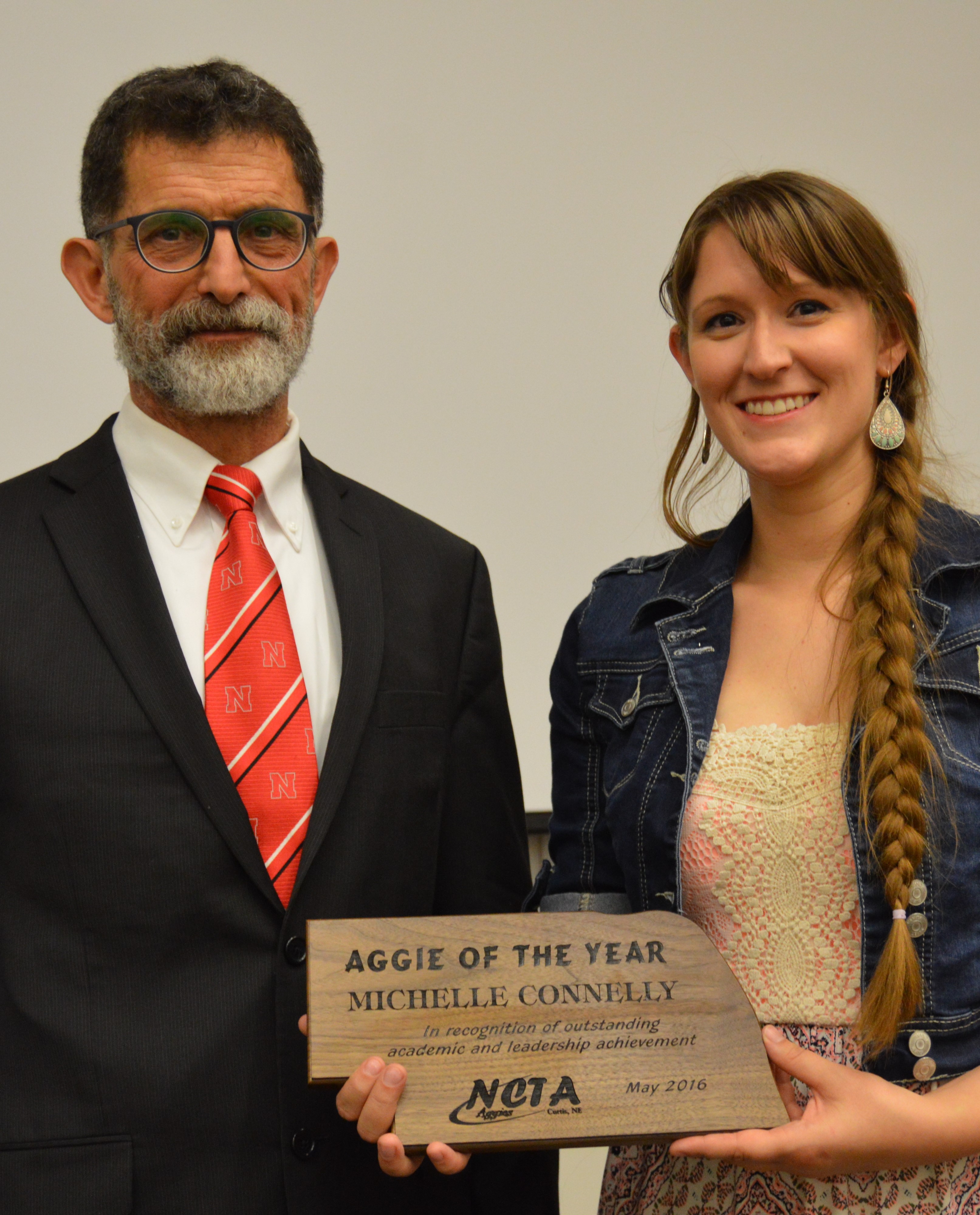 NCTA Dean Ron Rosati presents the 2016 Aggie of the Year award to Michelle Connelly, who is a certified veterinary technician with a private practice in Kearney. (Crawford/NCTA Photo)
