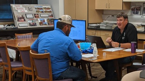 Dr. Brad Ramsdale, NCTA agronomy professor, meets with Pedro Bernal from Comanche, Texas, at New Student Enrollment last month. NCTA Dean Larry Gossen invites prospective students to attend the next NSE Day on Tuesday, July 7. (NCTA photo)