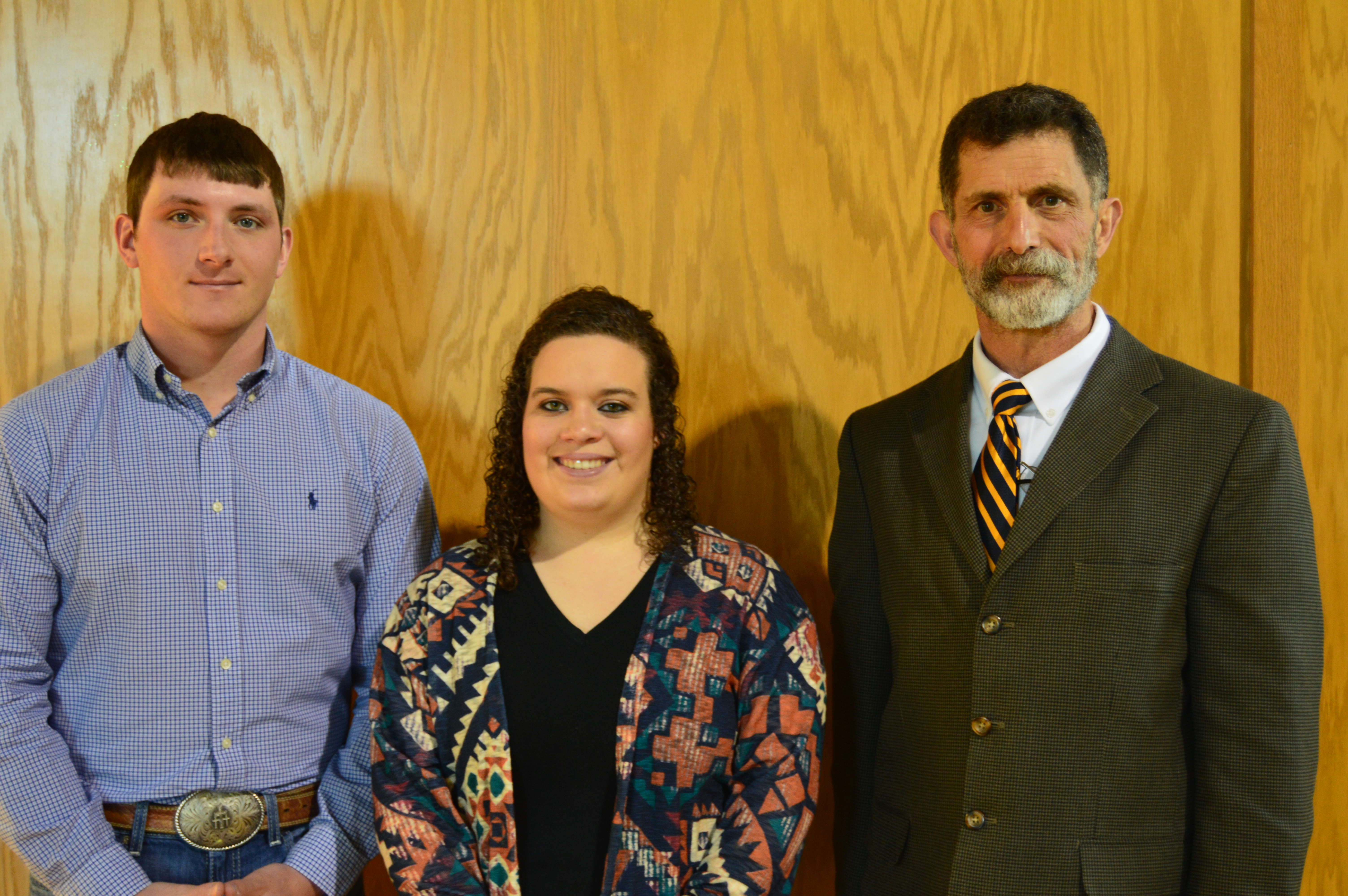 NCTA Regents Scholars Calvin DeVries of Fairfield and Haley Rogers of Lexington receive congratulations from NCTA Dean Ron Rosati. The pair graduate from NCTA May 5 and go on to UNL next fall. (NCTA News photo)