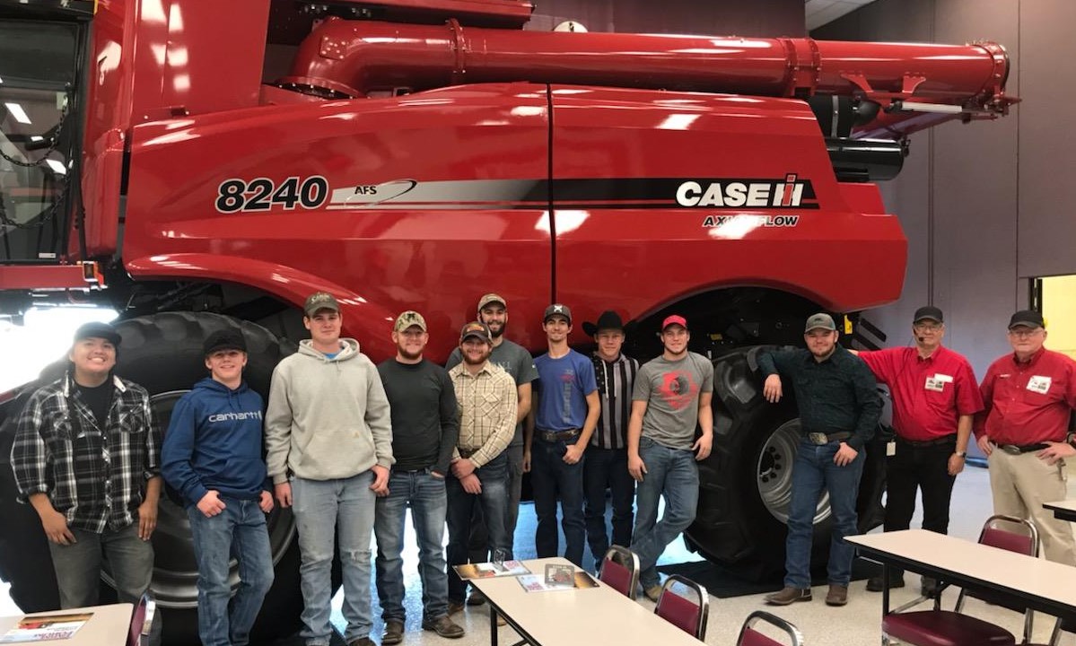 NCTA Aggie students saw manufacturing of an axial-flow combine last month. (L-R) Kolton Begay, Towaoc, Colo.; Jarrod Tuttle, Eltopia, Washington; Chase Stanley, Shickley; Dalton Olson, Kenesaw; Blake McCormick, Lewellen; Sam Schukci, Kenesaw; Clancey Smith, Amherst; Tanner Dickau, Bassett; Troyle Burris, Hoxie, Kansas; David Jelken, Juniata; and two guides from CNH. (Stehlik/NCTA Photo)