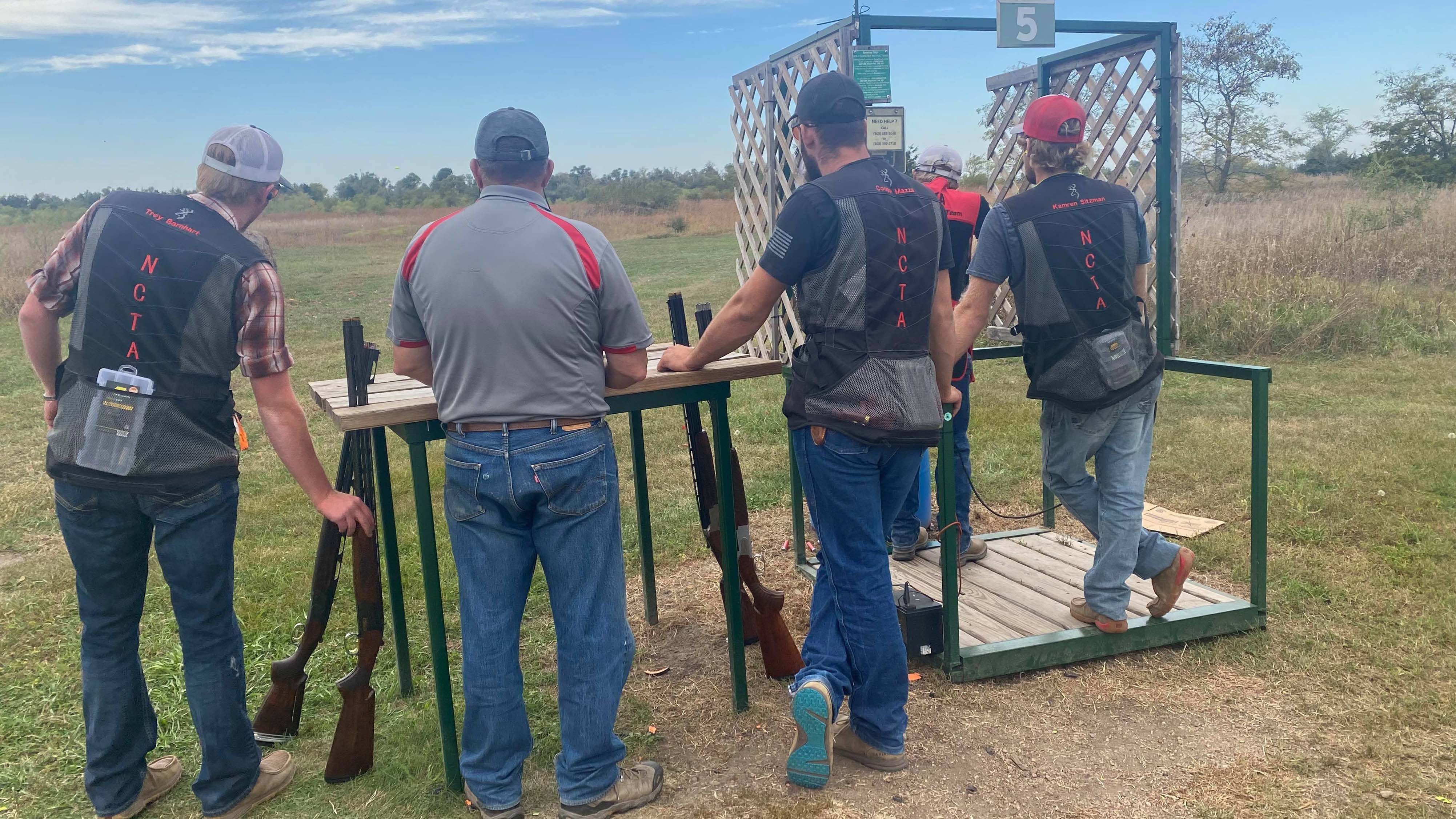 Aggie Shotgun Sports team members from the Nebraska College of Technical Agriculture are identified by NCTA vests. They shot last weekend in a match at Heartland Shooting Park near Grand Island. Coach Alan Taylor is second from left. (Photo by Kaden Bryant / NCTA)