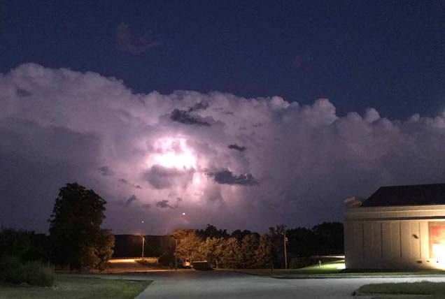 Severe weather with lightning hangs in storm clouds over the NCTA campus in Curtis. (Photo by Jeremy Sievers)