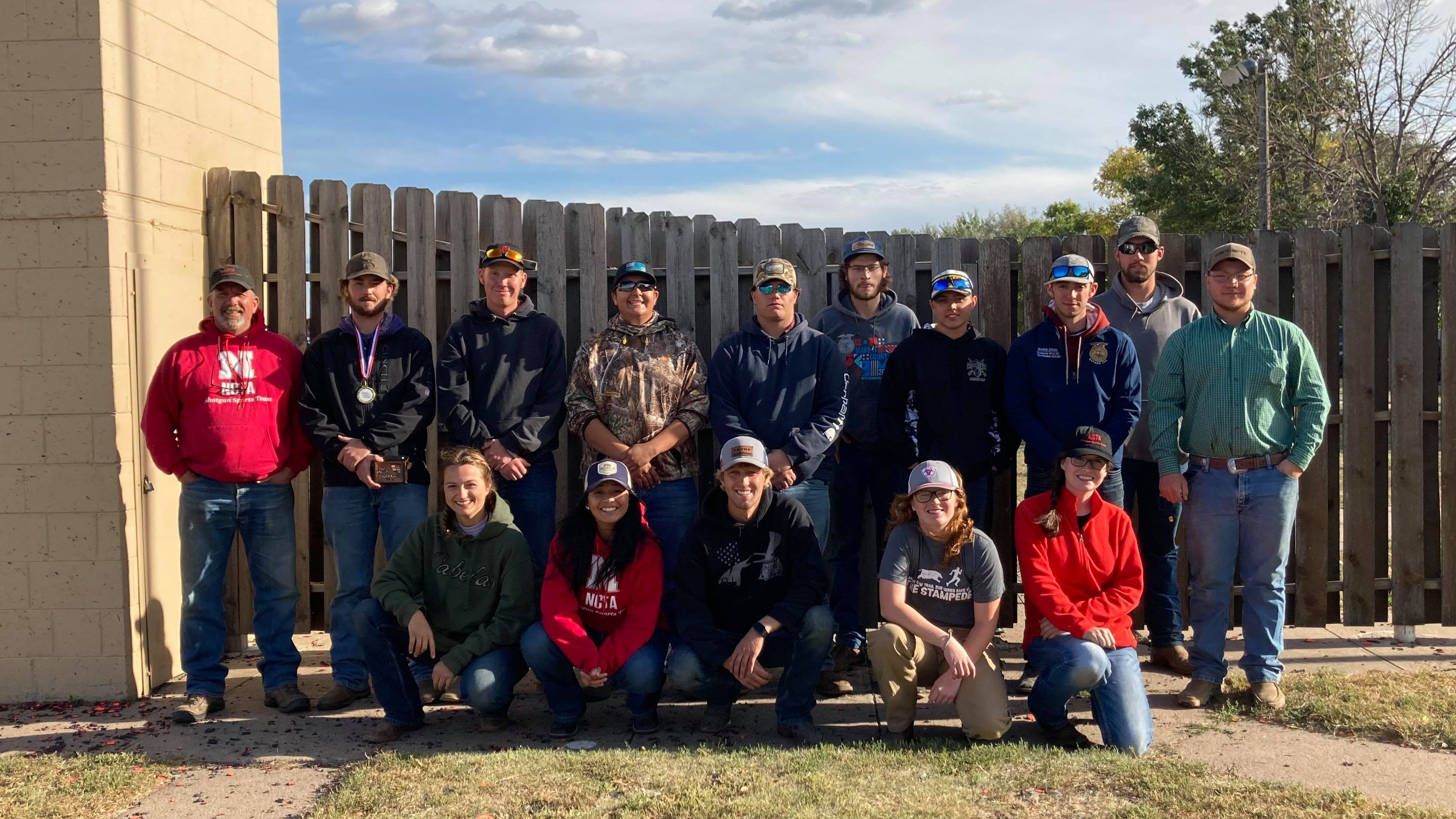 The Nebraska College of Technical Agriculture hosted the Prairie Circuit Conference sporting clays meet for 110 college athletes last weekend. Standing, at left are Coach Alan Taylor and Colby Mitchell of Burwell (third place), and joined by team members and NCTA student volunteers. (Kayden Bryant photo) 