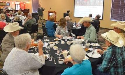 NCTA Dean Ron Rosati provided a “Campus Update” to nearly 90 Aggie alumni and friends in Broken Bow. Larry Trumbull (left, foreground) graduated in 1947. (Crawford/NCTA Photo)