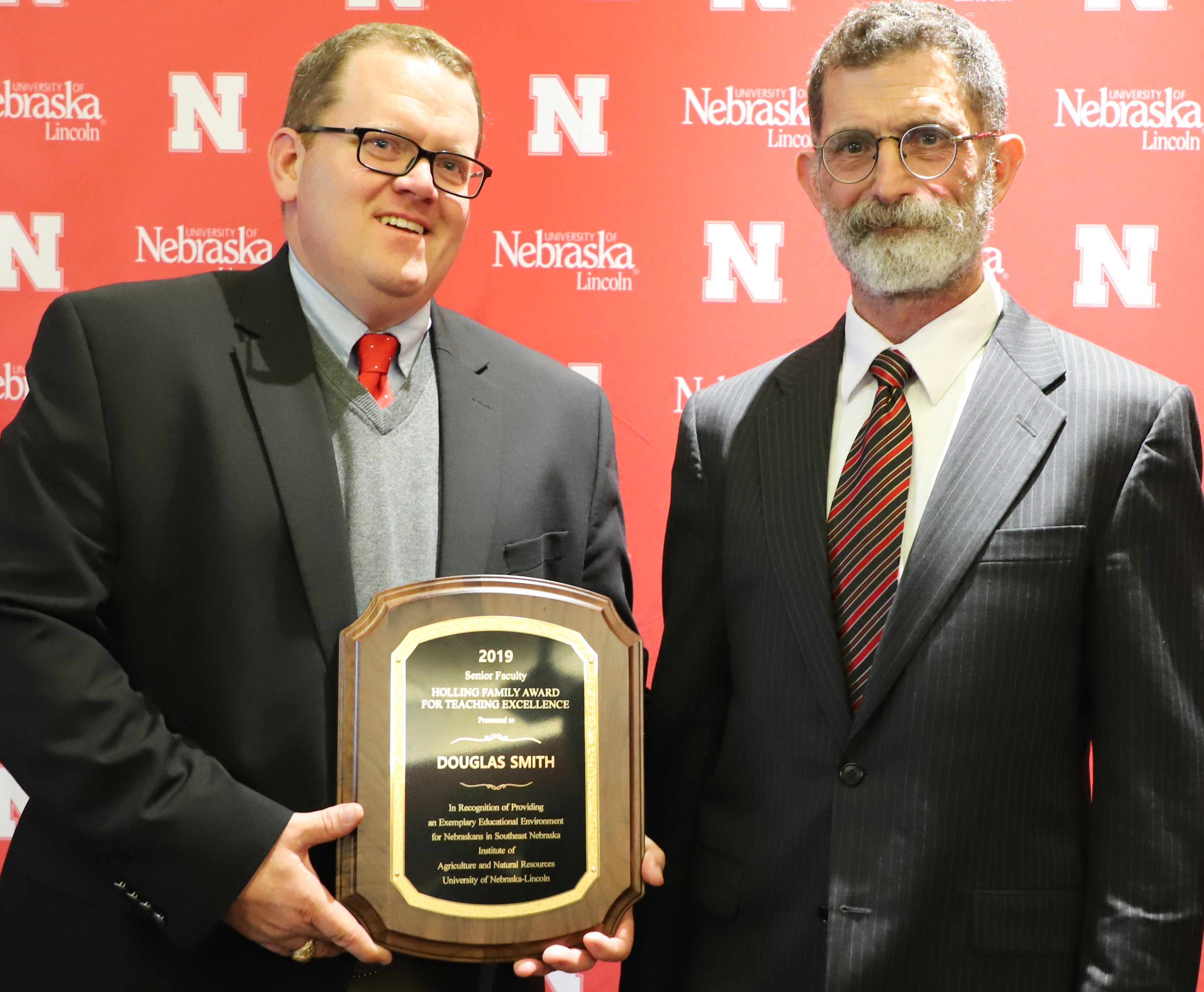 Dr. Douglas Smith, at left, received the IANR Holling Family Award for Teaching Excellence. NCTA Dean Ron Rosati attended the presentation ceremony in Lincoln. (Lana Johnson / IANR Photo)