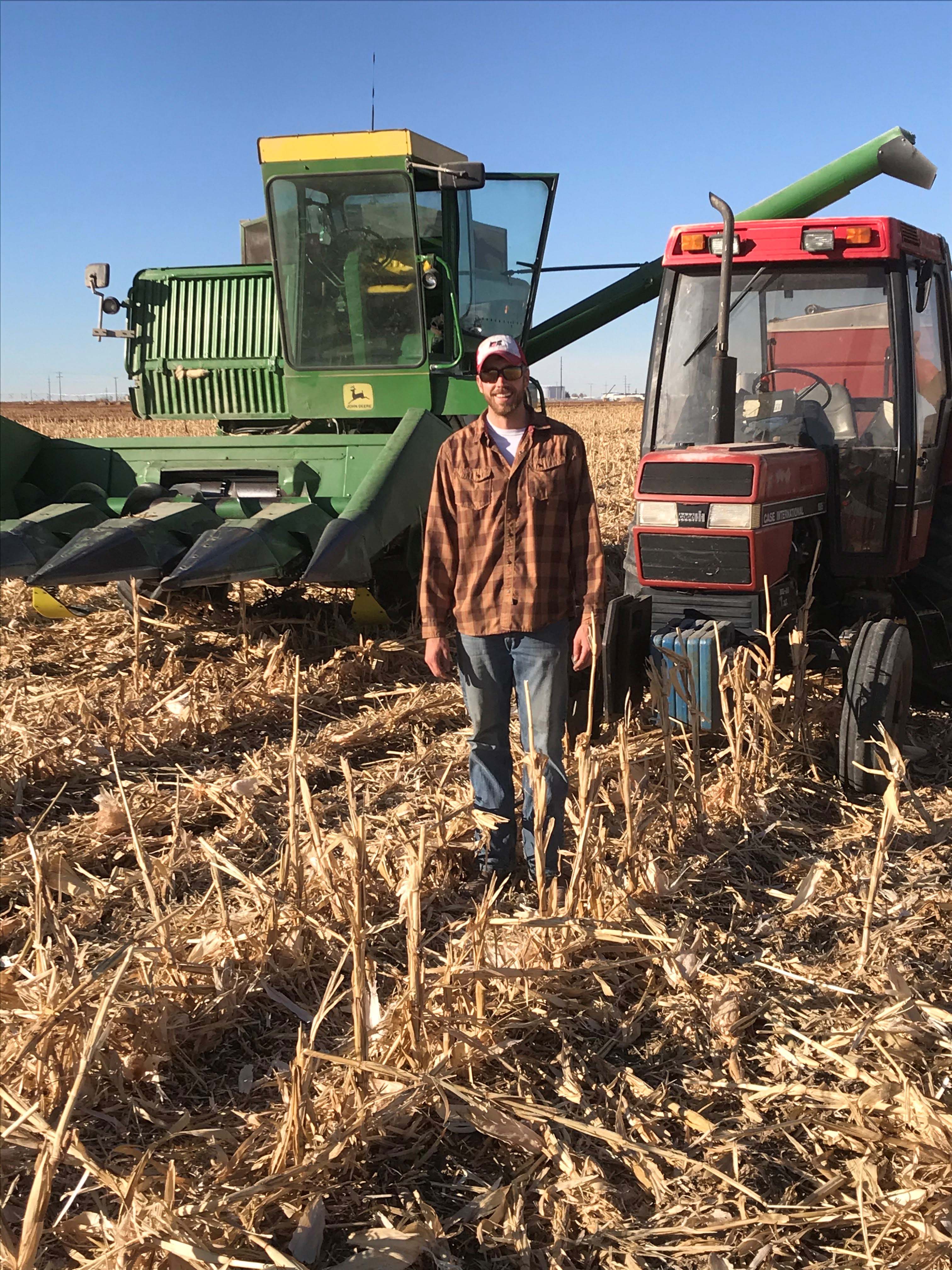 Ross Steward harvests corn at the USDA-ARS Limit Irrigation Research Farm near Greeley, Colorado. The native of Littleton credits trips to his grandparents’ farm and his college years, both in Nebraska, for a career path in crop management. (Courtesy photo)