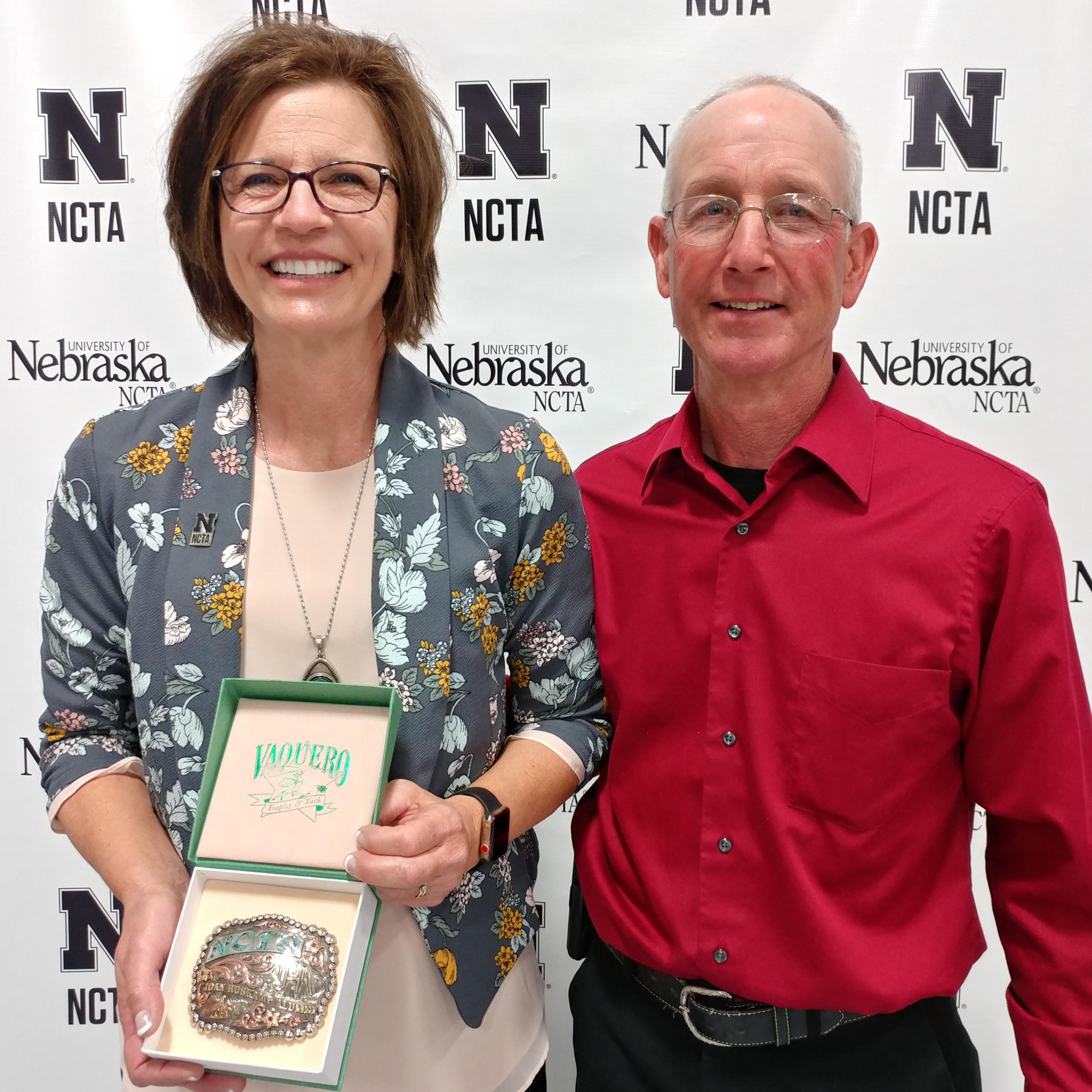 Joan and Steve Ruskamp of Dodge, UNSTA alumni from '80 and '76, returned to Curtis for 2019 Commencement where Joan gave a keynote message to graduates. She received an NCTA belt buckle. (NCTA photo)