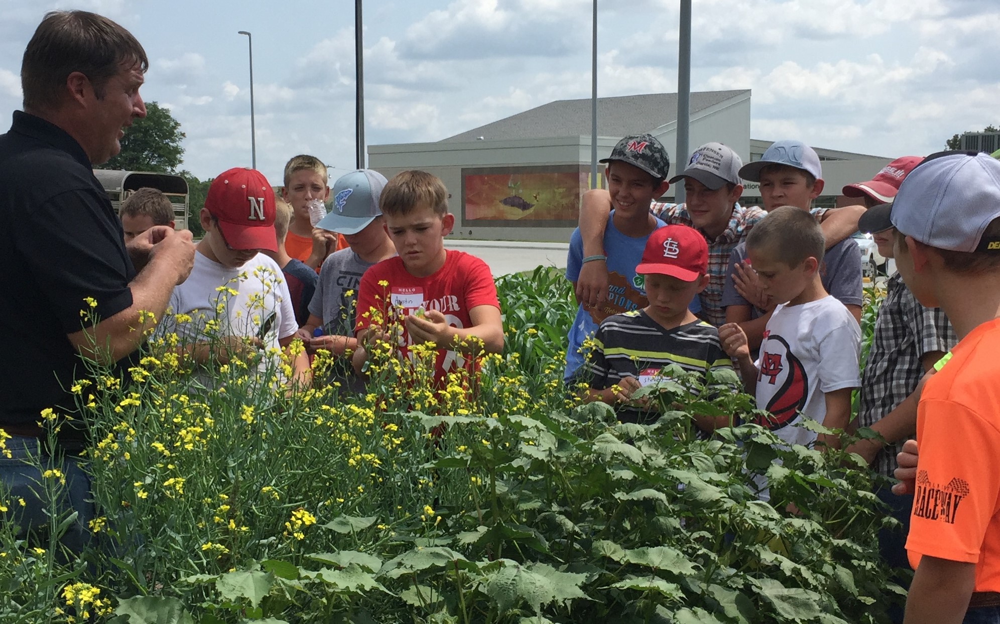 Dr. Brad Ramsdale, agronomy professor at the Nebraska College of Technical Agriculture in Curtis, discusses plant and weed identification at the Youth Agronomy Field Day in 2017. Students, ages 8-19, are encouraged to register by August 3 for the 2018 event. (Nebraska Extension photo)