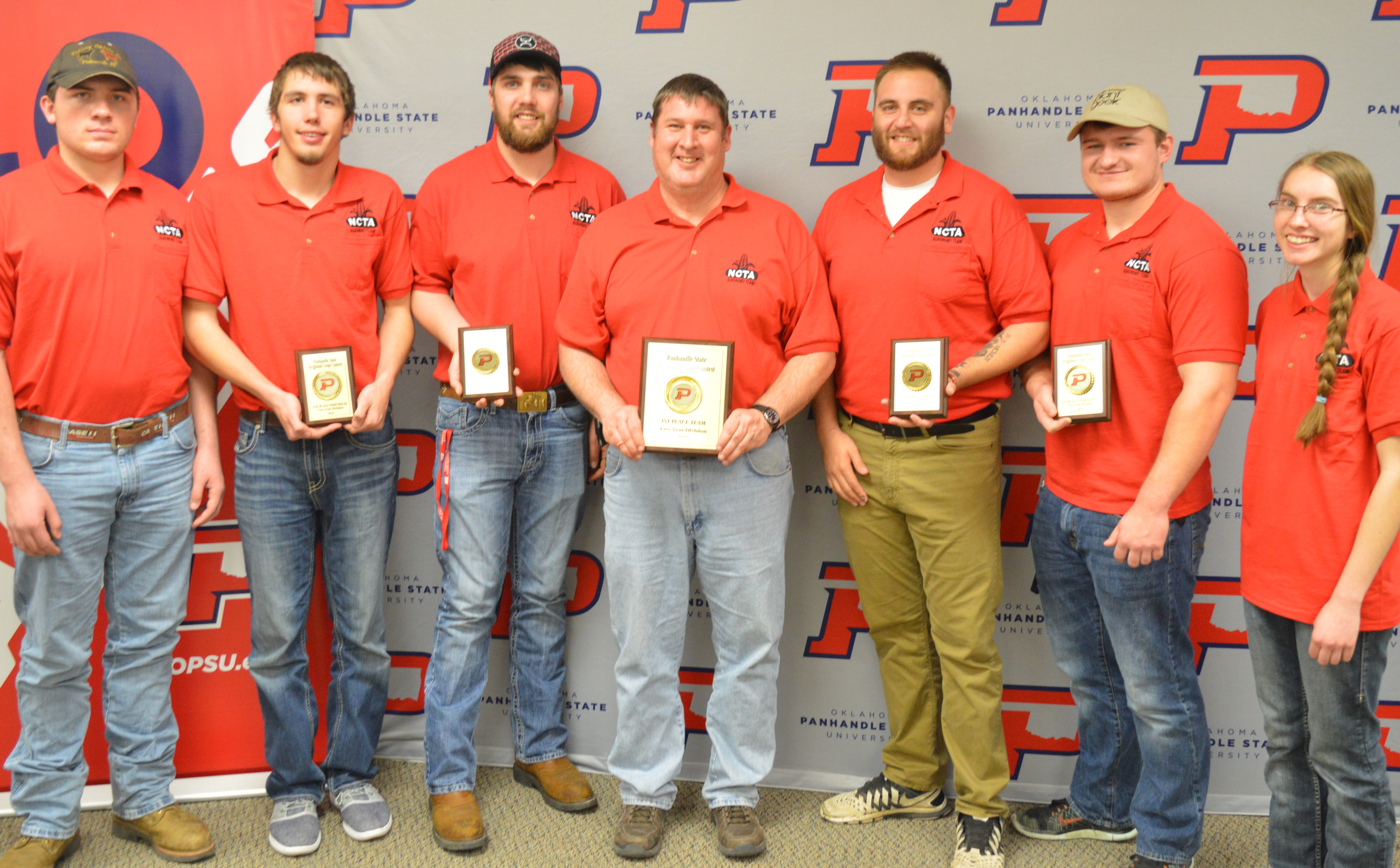 Agronomy team members flank their coach and instructor, Dr. Brad Ramsdale, after the NCTA Aggies won first place in a contest Saturday at Goodwell, Oklahoma. NCTA had the top four individuals, as well. From left, Jacob Valley, Plattsmouth; Lee Jespersen, Hemingford, tied for 3rd; Will Kusant, Comstock, 2nd; Coach Ramsdale with 1st place team plaque; Nate Montanez, Grand Island, 3rd tie; Dalon Koubek, North Platte, 1st place; and Catherine Ljunggren, Harvard. (Brent Thomas/NCTA News Photo)