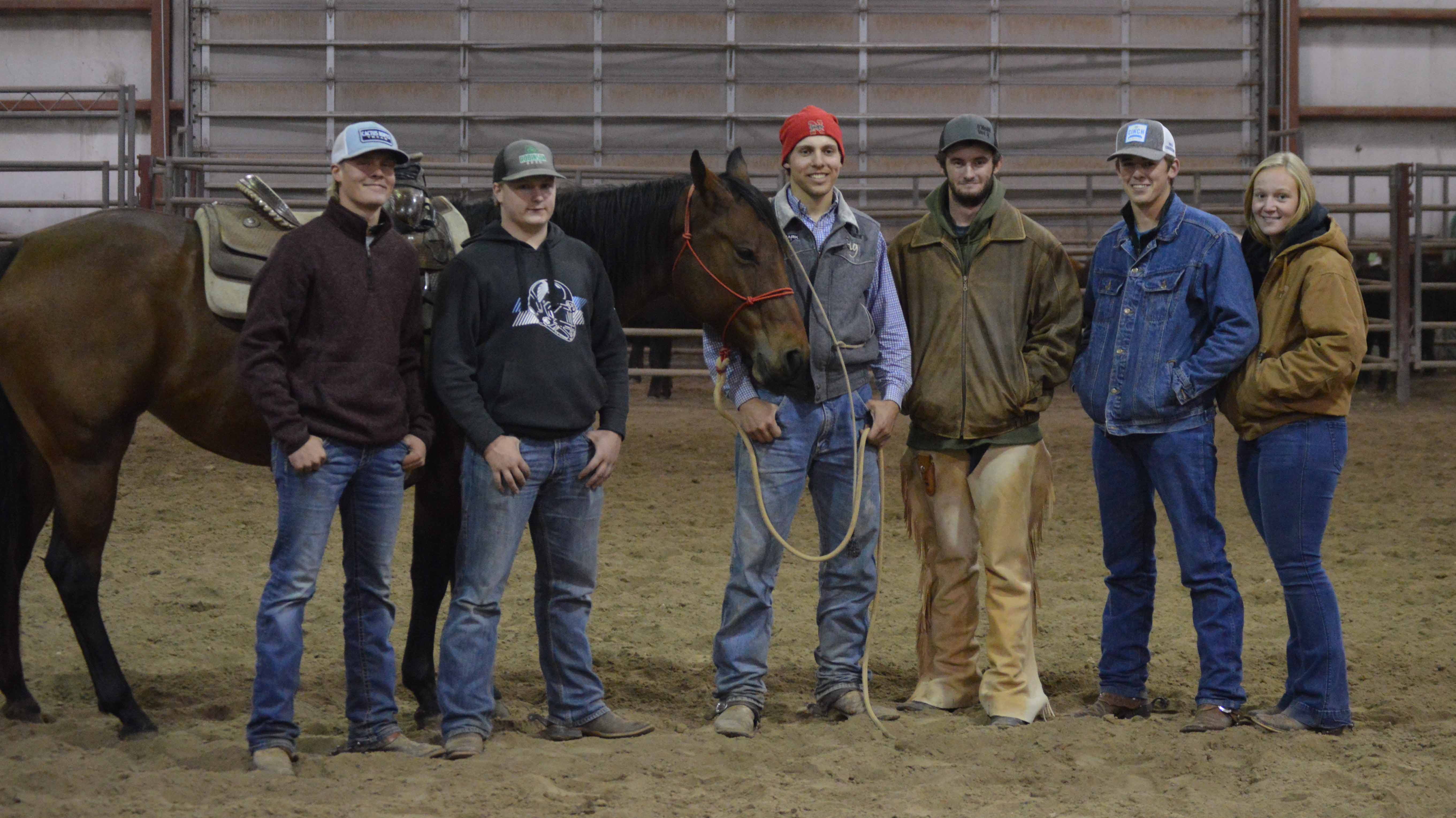 NCTA graduate Quentin Anderson of Pierce (center with horse) and his rodeo teammates, from left, Bryce Tobiassen, Hildreth; Ryan Smith, Ragan; Anderson, Wyatt Colman, O’Neill; Nathan Burnett, Shelton; and Caprice Christianson, Greenbush, Minnesota. Aggie Rodeo is an intercollegiate traveling team.  (Photo by Crawford/NCTA News)