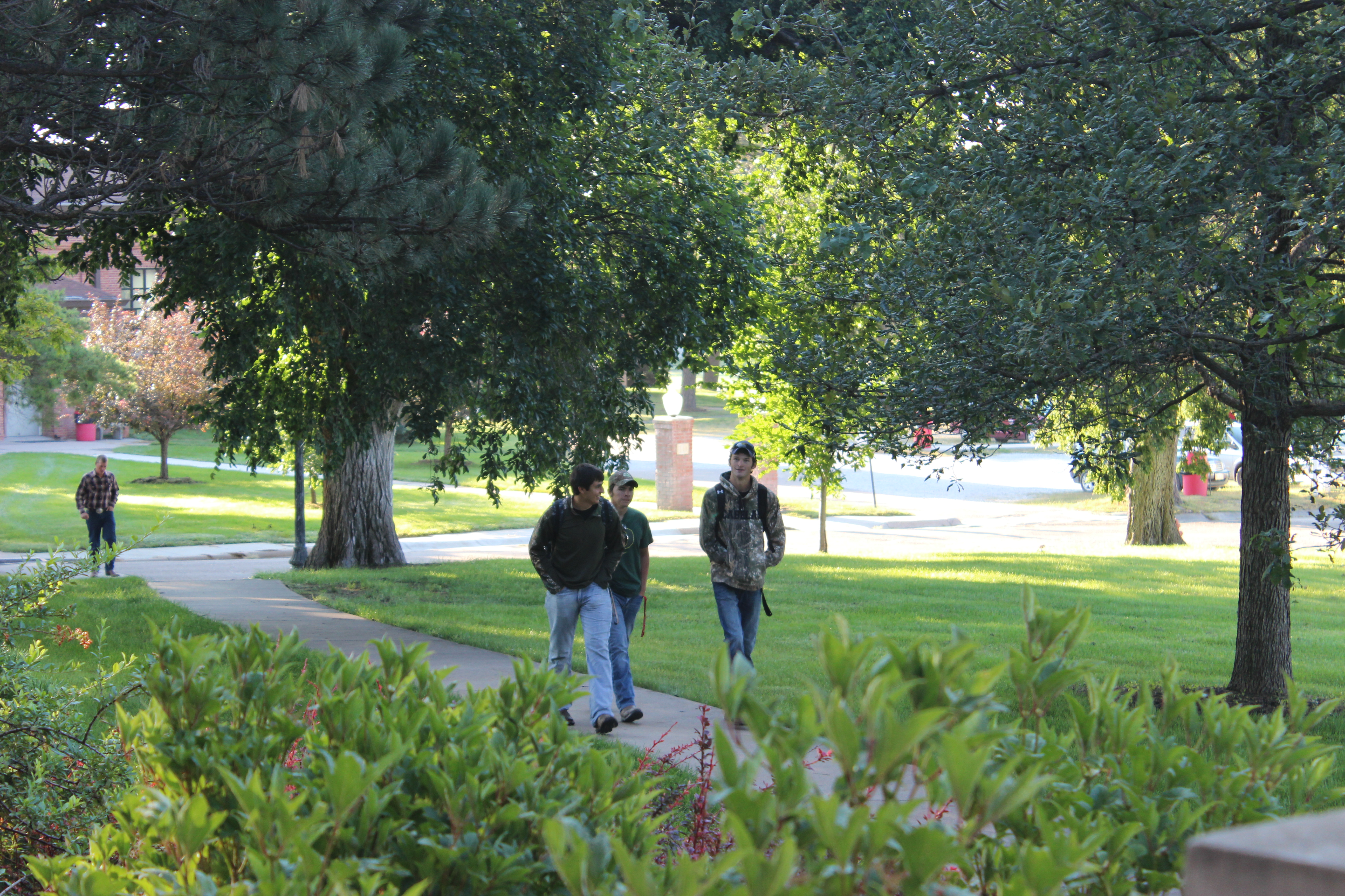 Students approach Agriculture Hall at NCTA campus