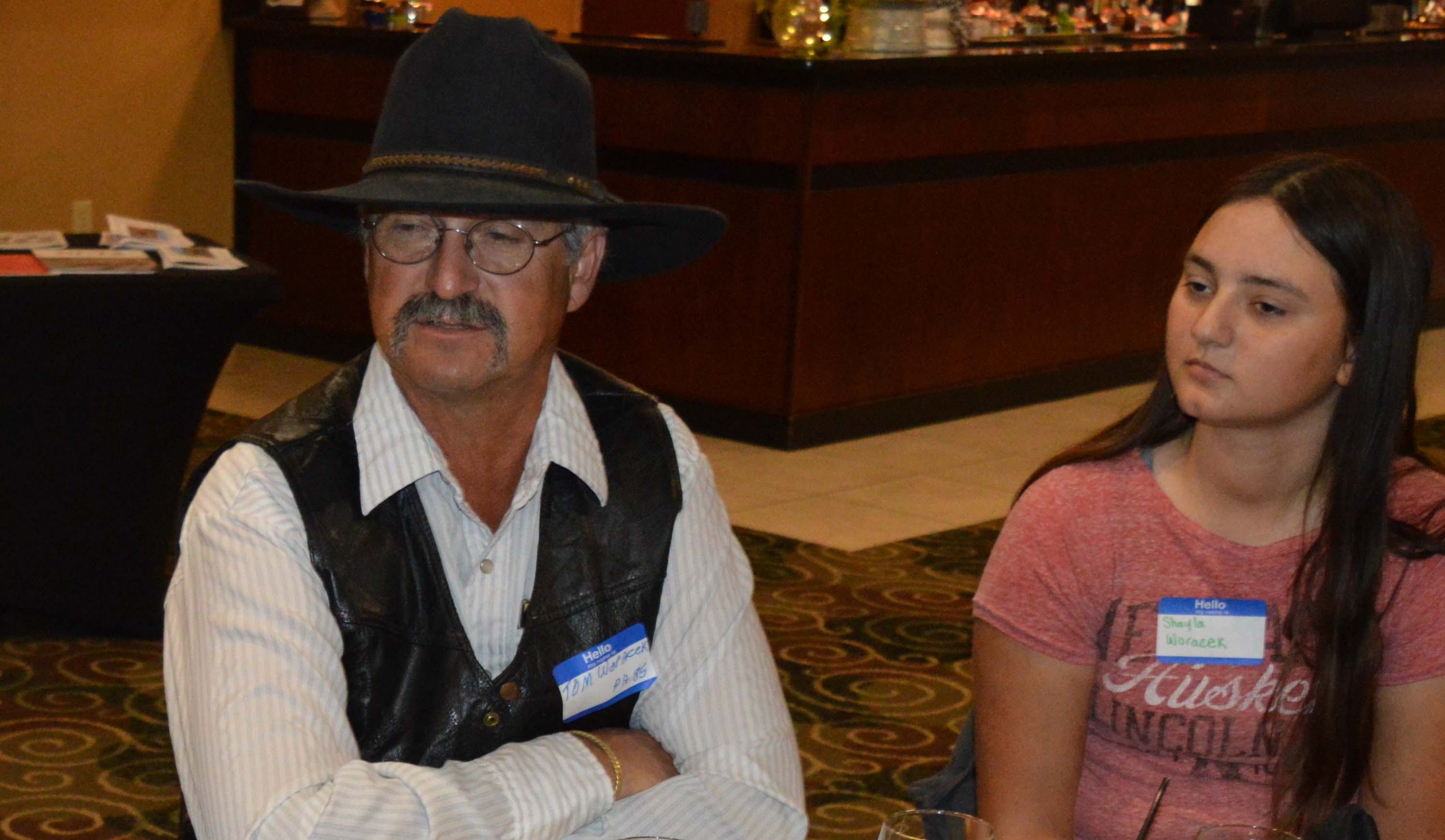 Thomas Woracek and his daughter, Shayla, of Maxwell, converse with friends at the 2019 reunion and banquet of the Aggie Alumni Association. Shayla, the Class of 2019 valedictorian, received an alumni scholarship last year. Thomas graduated production agriculture, '85. Applications for 2019-2020 are due September 6.