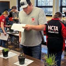 Students identifying plant species