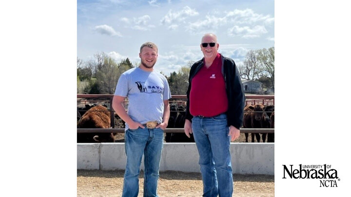 The latest Heifer Link recipient, Hadley Sayer of Wallace and Dean Larry Gossen.