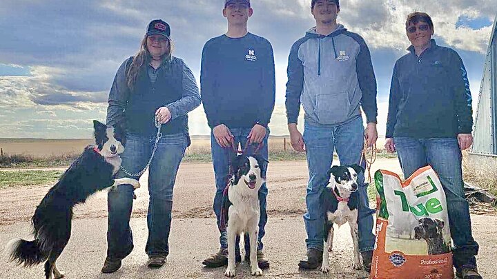 NCTA Stock Dog members (L -R): Sierra Holt, Sedalia, CO; Justin Ernest, Dalton, NE; and Trevor Kaiser, Quinter, KS. Event host Rhonda Pletcher is on the far right.