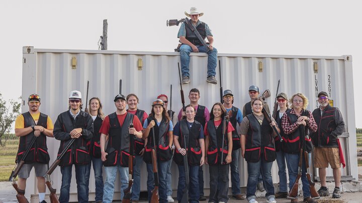 The NCTA Shotgun Sports team (Front L-R): Alex Wenzbauer, Odell; Conrad Burrow, Marysville, CA; Kyle Rote, Lisco; Paige Davis, Ogallala; Mallory Hanes, Huxton, CO; Lily Strong, Lancaster, CA; Morgan Madsen, Kearney; Charlie Houser, Cambridge; and Coach Alan Taylor. (Back L-R): Morgan Ekhoff, Aurora; Emma Huntley, Bennington; Brittney Dean, Plattsmouth; Tanner Hansen, Laurel; Dalton Casper, Rocky Ford, CO; Micaiah Barber, McCook; Hannah Brett, Middlesex, VT, and above Morgan Shaner, Fort Calhoun.