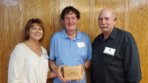 Bev and Del Van der Werff of Curtis were recognized in 2021 with the Alumni Service Award. It was presented by Dan Stehlik, Aggie Alumni Association secretary and awards chair. The couple worked at NCTA for nearly 30 years. (NCTA photo)