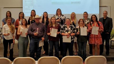 PTK officers, new and previously inducted initiates gathered May 5 for a ceremony at the NCTA Education Center. Individuals are listed in the article. (Photo by J. McConville / NCTA)