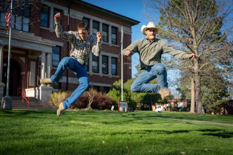 Cowboys demonstrate a bit of Aggie athleticism last spring. The two study animal science and have campus jobs with the NCTA farm in livestock management. (NCTA/Cannon Photo)