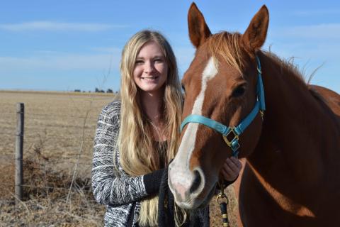 Emmaly Wright, a Lincoln native, brought her horse, Lucky, to college to be part of her academic studies in equine industry management at the Nebraska College of Technical Agriculture. (Photo by Annie Bassett, NCTA student)