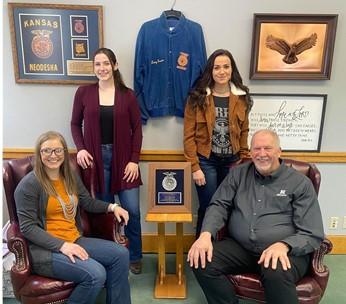 Officers of NCTA Collegiate FFA (L-R) Taylor Hendrix of Colorado, Gillian Brinker of Alaska and Taylor Sayer of Nebraska, assemble in the office of NCTA Dean Larry Gossen. The Nebraska College of Technical Agriculture is observing National FFA Week Feb. 20-27. (Kenna Graves / NCTA Photo)