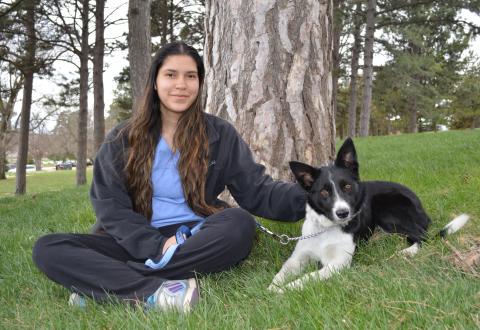 Ivana Burgos of Grand Island has been named the Aggie of the Month for April, 2019.  She is studying veterinary technology, shown here with Char, the dog she is training in an obedience class. (Photo by J. Kennicutt / NCTA News)