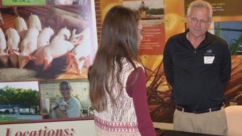 An animal science Aggie visits with Schwartz Farms about job prospects at the NCTA Career Fair in 2017. (NCTA File Photo)  