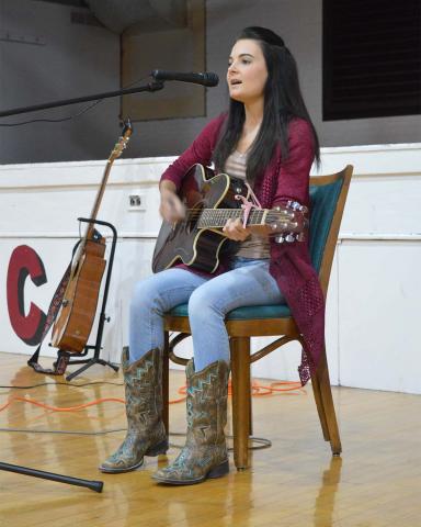Kylee Miller sharing her old country roots with listeners. (M.Crawford/NCTA News)