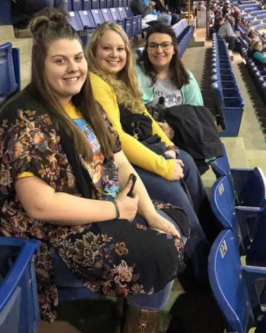 NCTA Ag Business club students, left to right, Kat Schick of Curtis, with Sophie Nutter and Paige Twohig, both of Wilcox, attend the National Western Stock Show's rodeo. The trio studied marketing techniques of businesses and vendors during a two-day study tour. (Rittenhouse/NCTA)