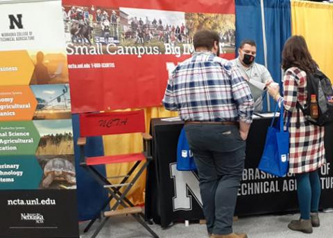 Rulon Taylor shares information about the Nebraska College of Technical Agriculture at the 2021 National FFA Convention. NCTA is an exhibitor at ag expos this winter, including the Colorado Farm Show at Grove Island Park in Greeley on January 25-27. (A. Taylor photo / NCTA)