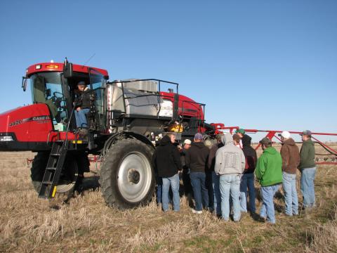 NCTA students learn about a field crop sprayer during a demonstration by Ag Valley Cooperative in Curtis. (Brad Ramsdale photo)  