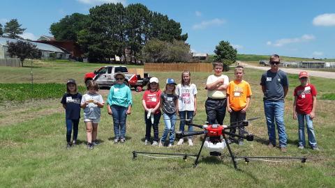 Youngsters ages 9 to 11 years learned how a drone can apply pesticides to crops at the 2021 Agronomy Youth Field Day at NCTA. (Photo by B. Ramsdale / NCTA)